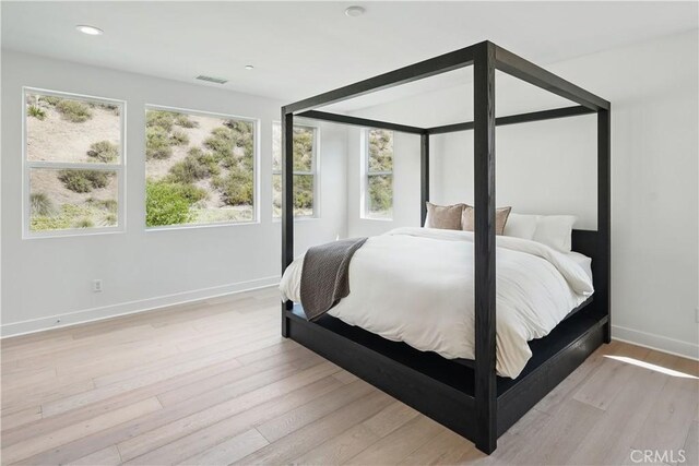 18814 Annmae Pl, Saugus, CA 91350 - bedroom featuring light wood-type flooring and recessed lighting