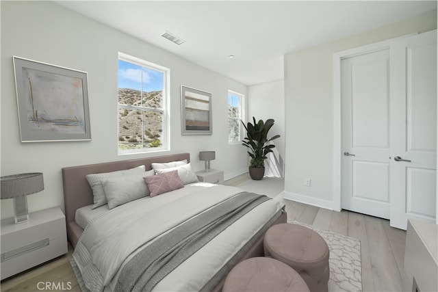 18814 Annmae Pl, Saugus, CA 91350 - bedroom with light wood finished floors and baseboards
