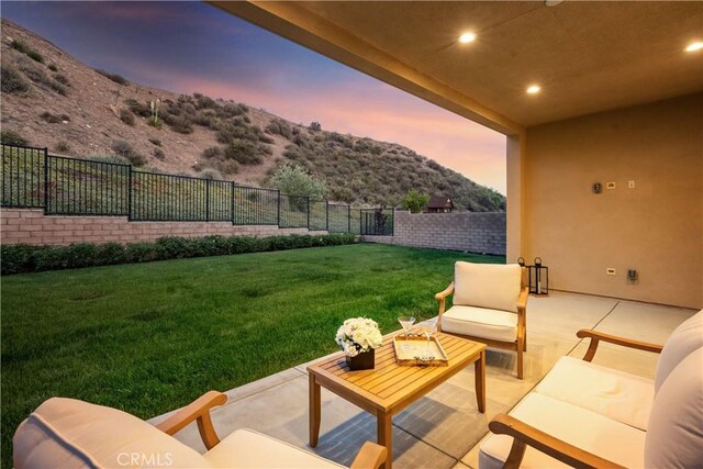 18814 Annmae Pl, Saugus, CA 91350 - fenced backyard with outdoor lounge area, a mountain view, and a patio area