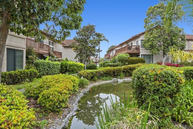 4075 Carmel View Rd Unit 11, San Diego, CA 92130 - view of home's community with a small pond