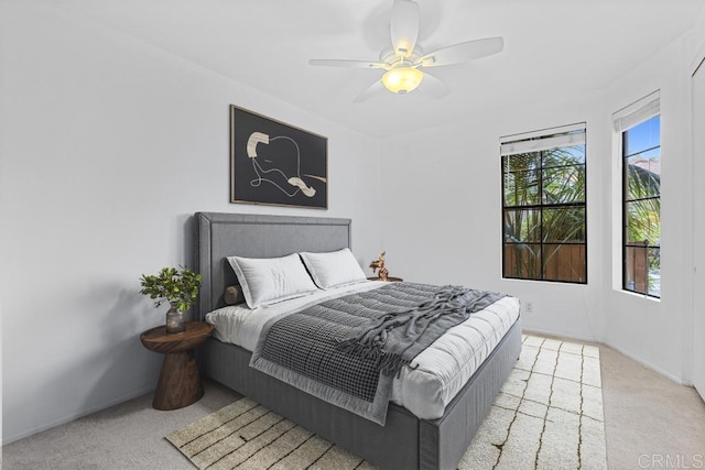 4075 Carmel View Rd Unit 11, San Diego, CA 92130 - carpeted bedroom featuring ceiling fan and baseboards
