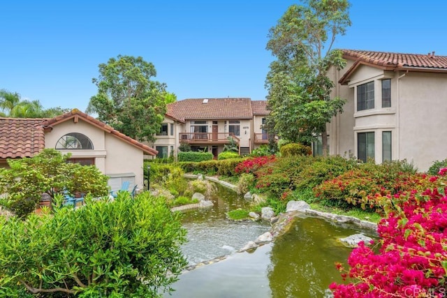 4075 Carmel View Rd Unit 11, San Diego, CA 92130 - view of property's community with a small pond