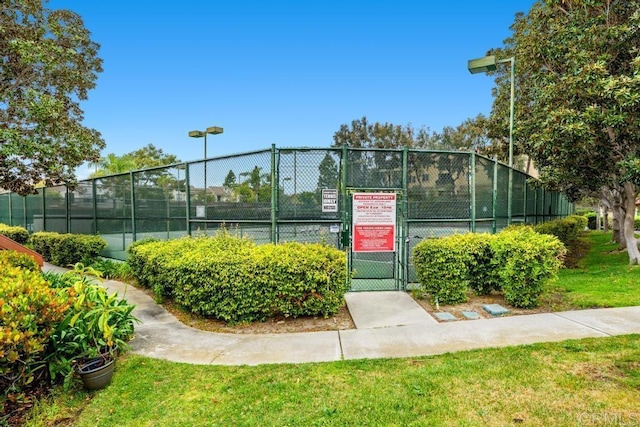 4075 Carmel View Rd Unit 11, San Diego, CA 92130 - view of tennis court featuring a gate