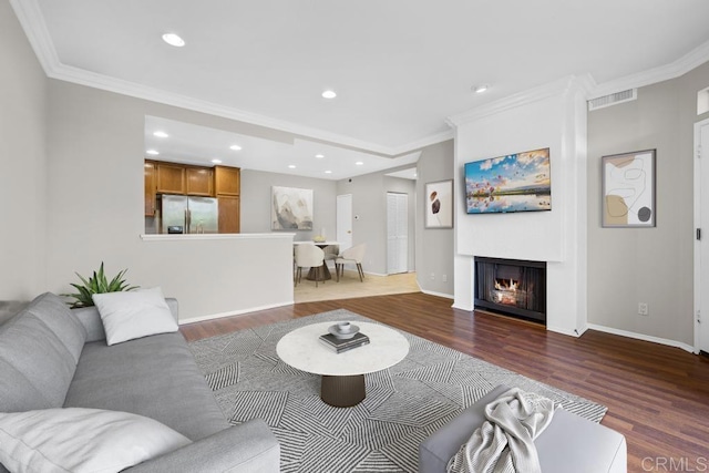 4075 Carmel View Rd Unit 11, San Diego, CA 92130 - living room featuring wood finished floors, ornamental molding, a lit fireplace, recessed lighting, and baseboards