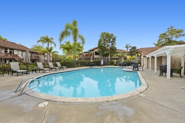 4075 Carmel View Rd Unit 11, San Diego, CA 92130 - community pool featuring a patio, a pergola, and a residential view