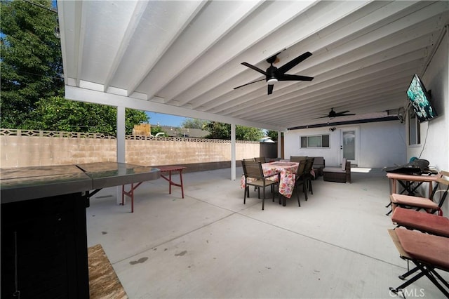 9966 Vernon Ave, Montclair, CA 91763 - view of patio / terrace with outdoor dining area and ceiling fan