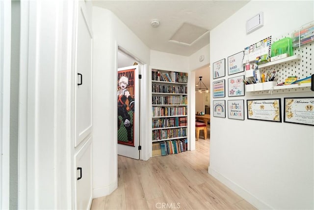 9966 Vernon Ave, Montclair, CA 91763 - corridor featuring wood finished floors and baseboards