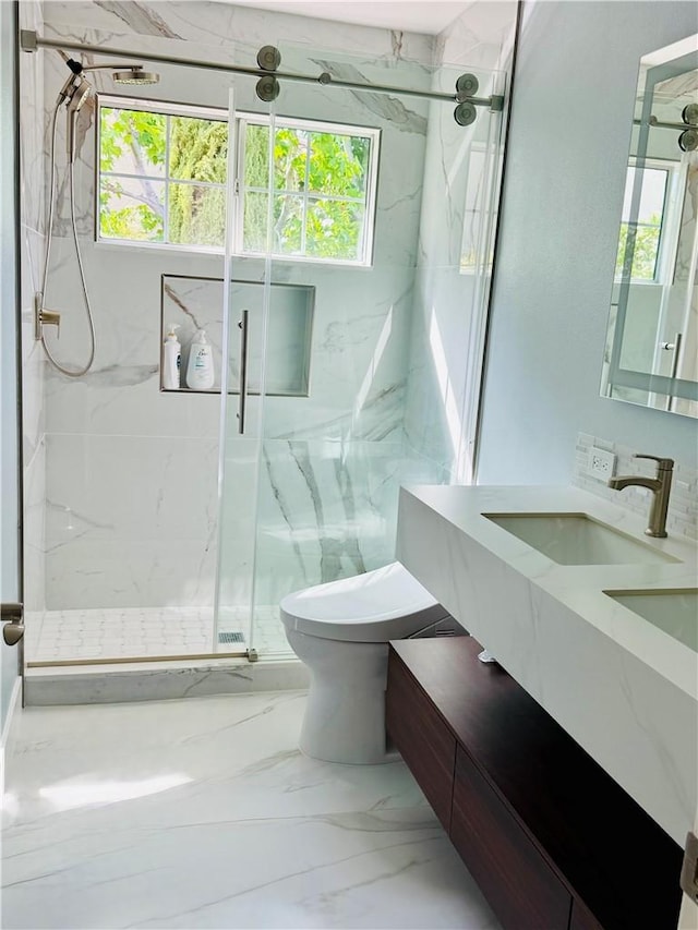 25792 Maple View Dr, Laguna Hills, CA 92653 - bathroom featuring a marble finish shower, plenty of natural light, vanity, and toilet
