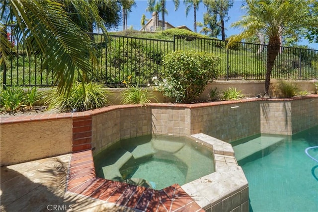 25792 Maple View Dr, Laguna Hills, CA 92653 - view of swimming pool featuring a fenced backyard and a pool with connected hot tub