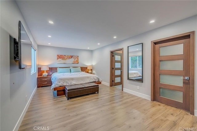 3921 Beverly Glen Blvd, Sherman Oaks, CA 91423 - bedroom with light wood-style floors, baseboards, and recessed lighting