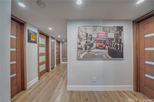 3921 Beverly Glen Blvd, Sherman Oaks, CA 91423 - corridor with wood finished floors, baseboards, and recessed lighting