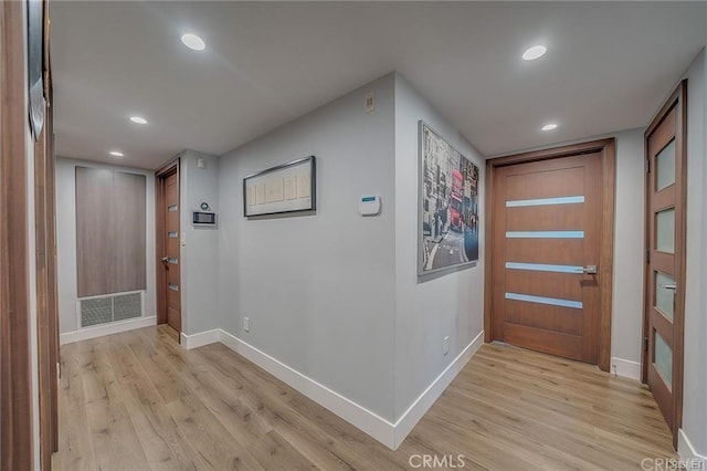 3921 Beverly Glen Blvd, Sherman Oaks, CA 91423 - entryway featuring light wood-style floors, baseboards, and recessed lighting