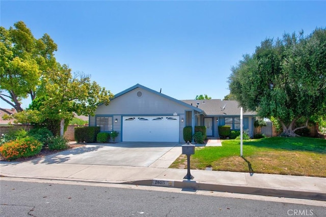 28015 Tupelo Ridge Dr, Valencia, CA 91354 - ranch-style home with an attached garage, a front lawn, and concrete driveway
