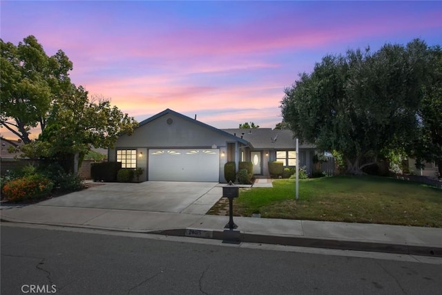 28015 Tupelo Ridge Dr, Valencia, CA 91354 - ranch-style house featuring concrete driveway, an attached garage, and a yard