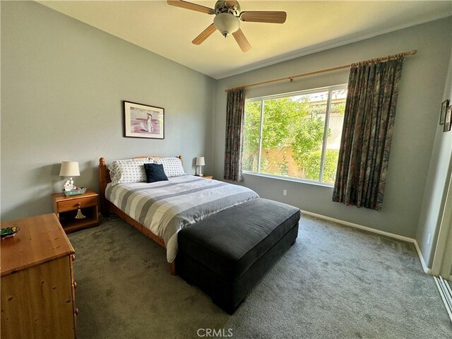 5836 Indian Canyon Dr, Banning, CA 92220 - bedroom featuring carpet, baseboards, and a ceiling fan
