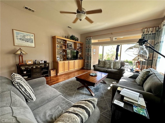 5836 Indian Canyon Dr, Banning, CA 92220 - living area featuring a ceiling fan and dark wood-style floors
