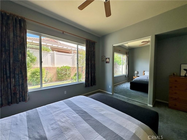 5836 Indian Canyon Dr, Banning, CA 92220 - carpeted bedroom featuring a closet, baseboards, and a ceiling fan