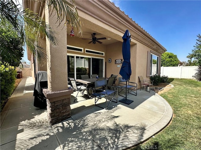 5836 Indian Canyon Dr, Banning, CA 92220 - view of patio with ceiling fan and outdoor dining area
