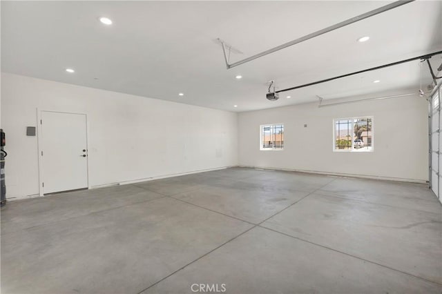 22212 Lone Eagle Rd, Apple Valley, CA 92308 - garage with a garage door opener and recessed lighting