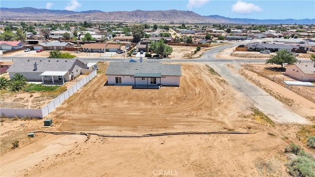 22212 Lone Eagle Rd, Apple Valley, CA 92308 - aerial view of residential area featuring a mountain backdrop