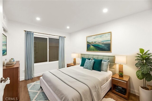12573 Brickellia St, San Diego, CA 92129 - bedroom featuring wood finished floors, recessed lighting, and baseboards