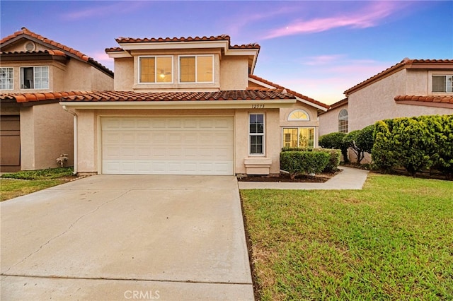 12573 Brickellia St, San Diego, CA 92129 - view of front facade with driveway, a tile roof, stucco siding, a front yard, and an attached garage
