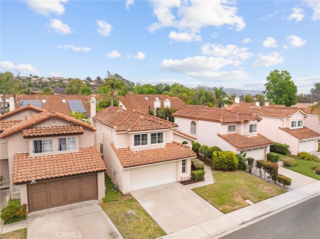 12573 Brickellia St, San Diego, CA 92129 - view of front of home featuring a residential view, stucco siding, a tiled roof, driveway, and a garage
