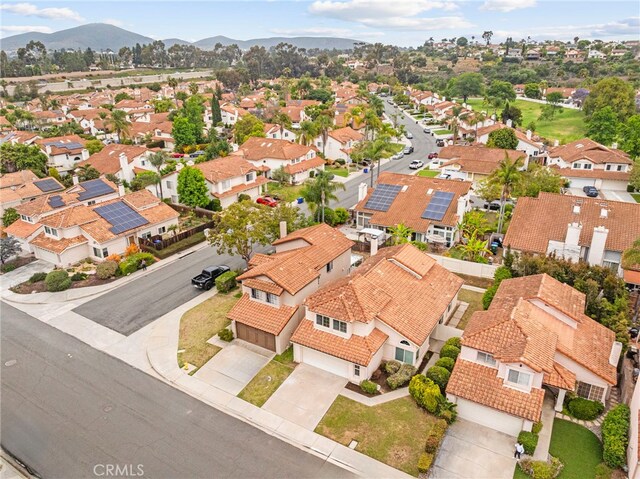 12573 Brickellia St, San Diego, CA 92129 - aerial perspective of suburban area featuring a mountainous background