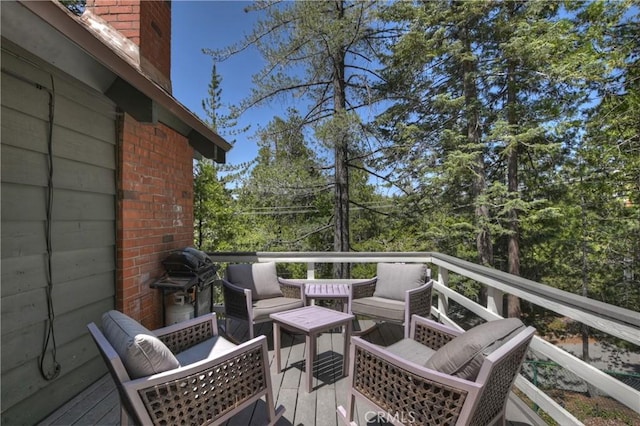 535 Pioneer Rd, Lake Arrowhead, CA 92352 - wooden terrace featuring grilling area and an outdoor hangout area