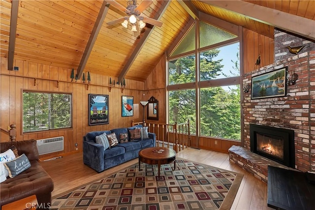 535 Pioneer Rd, Lake Arrowhead, CA 92352 - living room with hardwood / wood-style flooring, wood ceiling, ceiling fan, wooden walls, and a brick fireplace