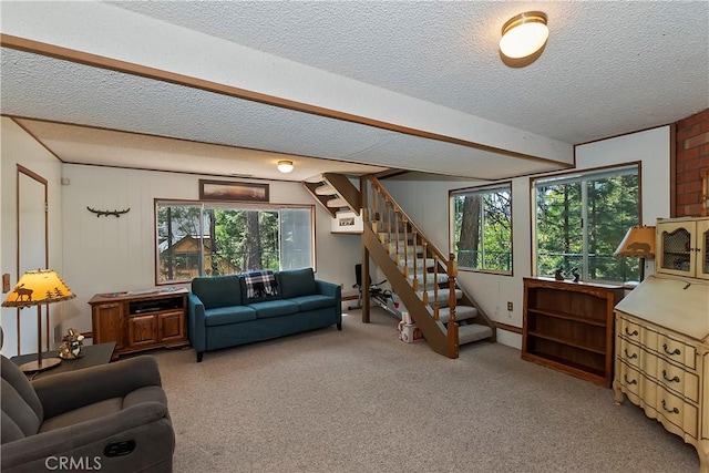 535 Pioneer Rd, Lake Arrowhead, CA 92352 - living area featuring stairs, light colored carpet, and a textured ceiling
