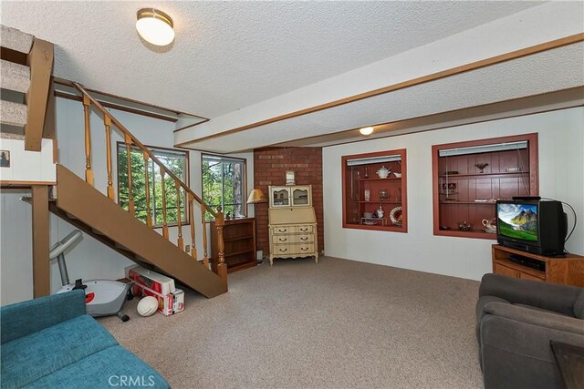 535 Pioneer Rd, Lake Arrowhead, CA 92352 - living room with carpet flooring, a textured ceiling, and stairway