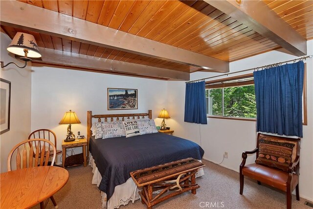 535 Pioneer Rd, Lake Arrowhead, CA 92352 - carpeted bedroom with a wood ceiling with exposed beams