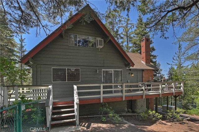 535 Pioneer Rd, Lake Arrowhead, CA 92352 - rear view of property with a deck and a chimney