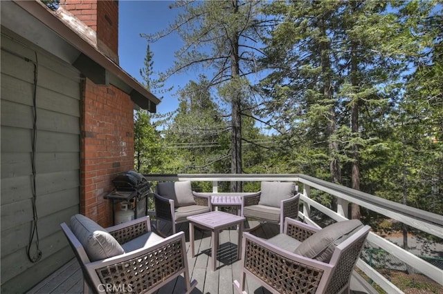 535 Pioneer Rd, Lake Arrowhead, CA 92352 - deck with grilling area and an outdoor living space