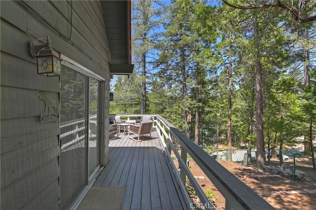 535 Pioneer Rd, Lake Arrowhead, CA 92352 - wooden terrace featuring view of scattered trees