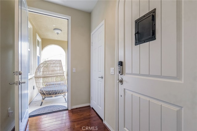 28426 Herrera St, Valencia, CA 91354 - foyer featuring dark wood-style flooring and baseboards
