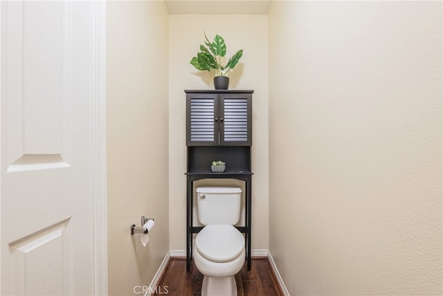 28426 Herrera St, Valencia, CA 91354 - bathroom with wood finished floors, toilet, and baseboards