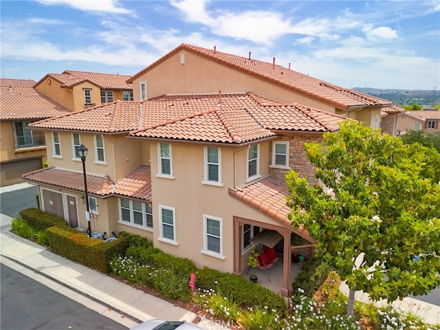 28426 Herrera St, Valencia, CA 91354 - view of building exterior with a residential view
