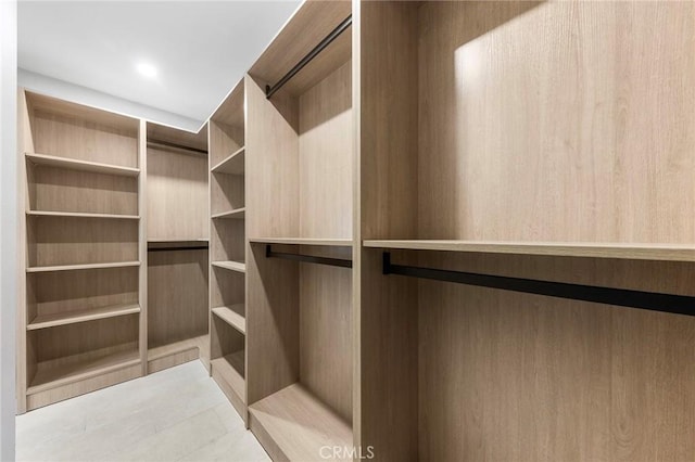 8093 Banyan St, Rancho Cucamonga, CA 91701 - walk in closet featuring light tile patterned flooring