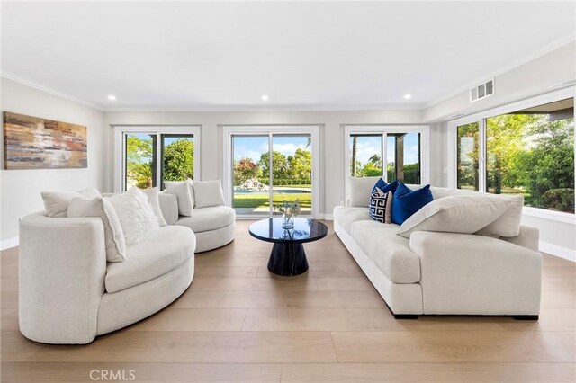 8093 Banyan St, Rancho Cucamonga, CA 91701 - living room featuring crown molding, recessed lighting, and baseboards