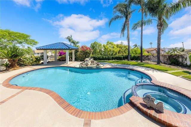 8093 Banyan St, Rancho Cucamonga, CA 91701 - view of swimming pool with a gazebo and a pool with connected hot tub