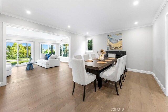 8093 Banyan St, Rancho Cucamonga, CA 91701 - dining area featuring wood finished floors, recessed lighting, baseboards, and ornamental molding