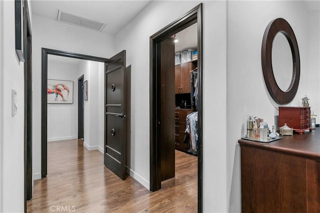 3101 San Gabriel Ave, Glendale, CA 91208 - hallway featuring wood finished floors, baseboards, and attic access