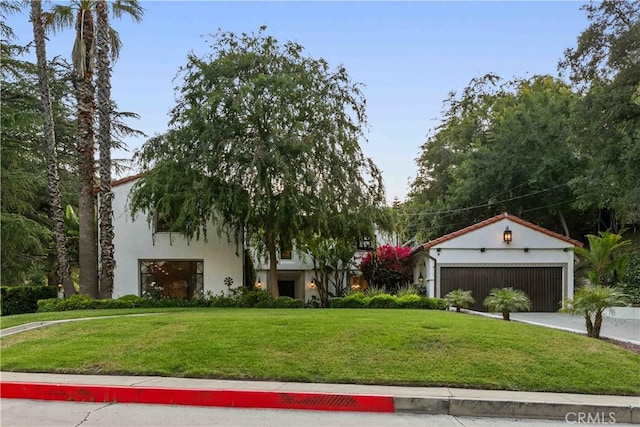3101 San Gabriel Ave, Glendale, CA 91208 - mediterranean / spanish home with a garage, a front lawn, and stucco siding