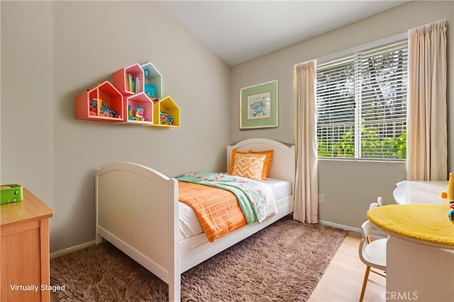 27523 Wellington Ct, Valencia, CA 91354 - bedroom with baseboards and wood finished floors