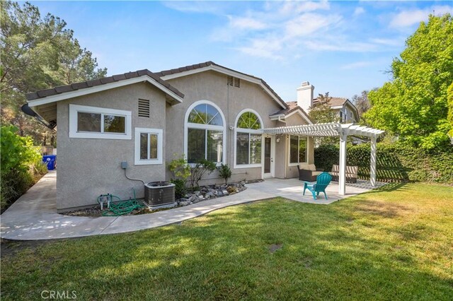 27523 Wellington Ct, Valencia, CA 91354 - rear view of property featuring a pergola, a patio area, stucco siding, and cooling unit