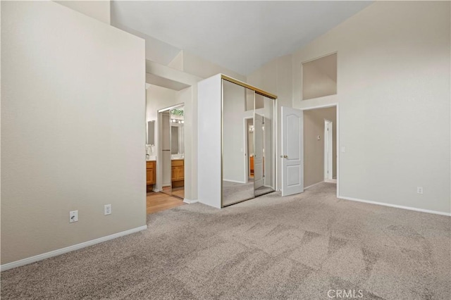 27523 Wellington Ct, Valencia, CA 91354 - unfurnished room with light carpet, baseboards, and lofted ceiling
