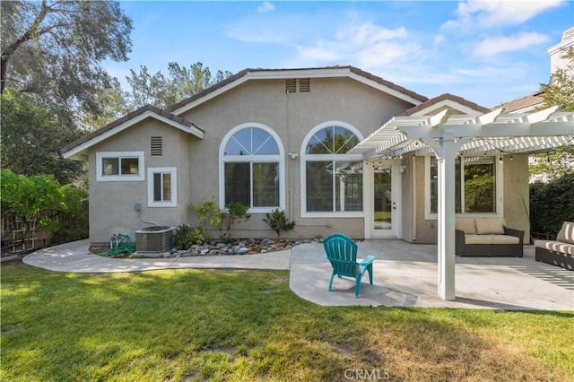 27523 Wellington Ct, Valencia, CA 91354 - rear view of house featuring a pergola, stucco siding, an outdoor living space, a patio area, and a yard