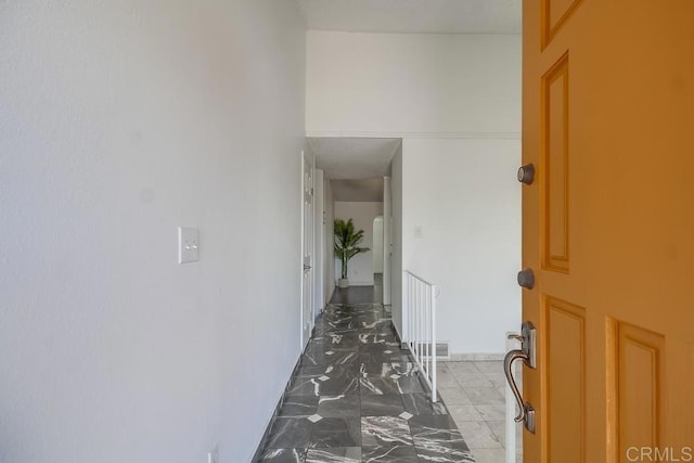 1695 Bubbling Well Dr, San Diego, CA 92154 - corridor with light marble finish floors